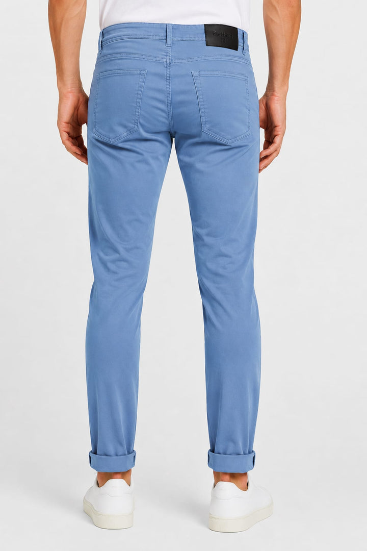 Side view of REHASH stretch jeans for men in black with topstitching details - Valérie Simon