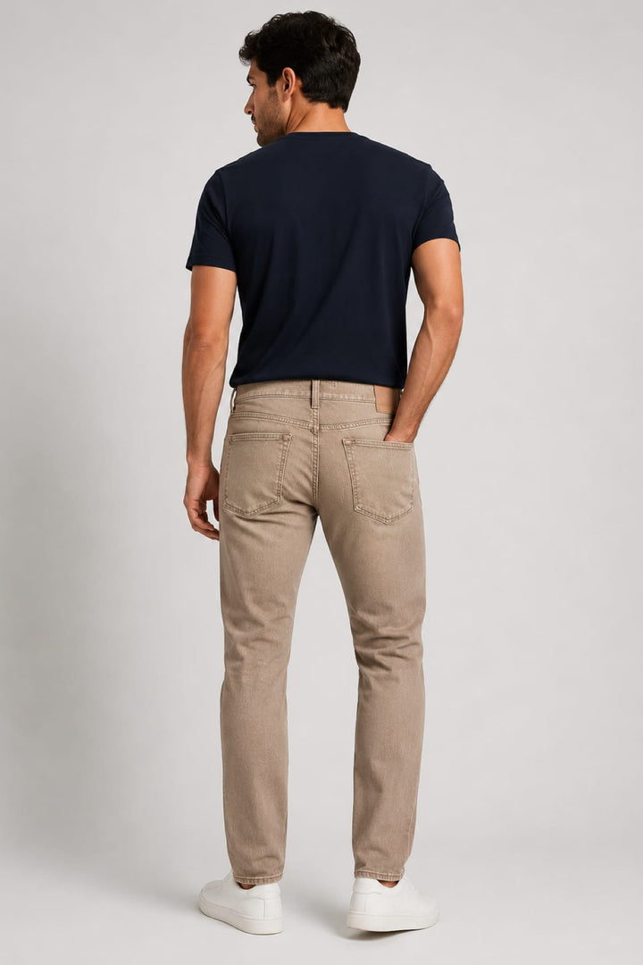 Vue latérale jean Clint moderne extensible délavé homme gris détails usés Brax - Valérie Simon