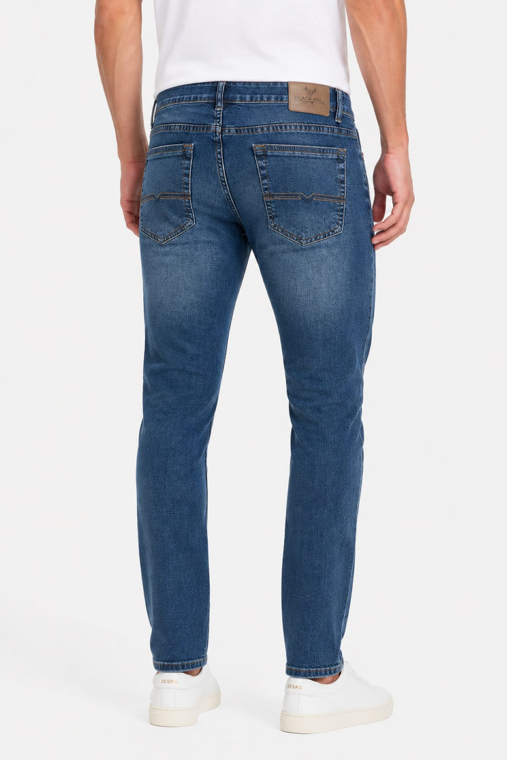 Side view of Black Bull men's black stretch jeans with exposed seams - Valérie Simon