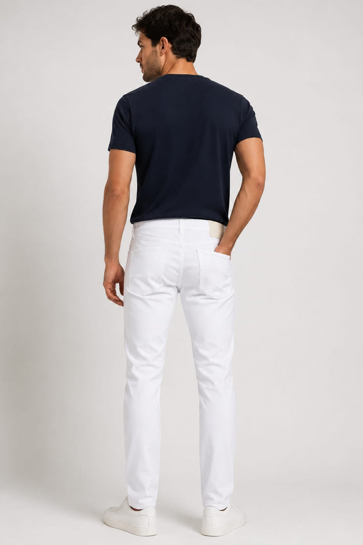 Vue latérale jean moderne Brax pour homme gris foncé boutons distinctifs - Valérie Simon