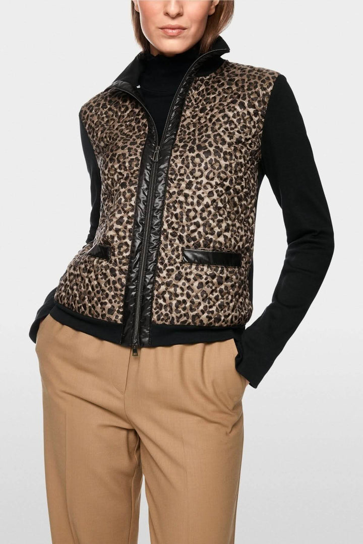 Veste avec manche à imprimé animalier, fermeture éclair, manches longues, détails contrastés.