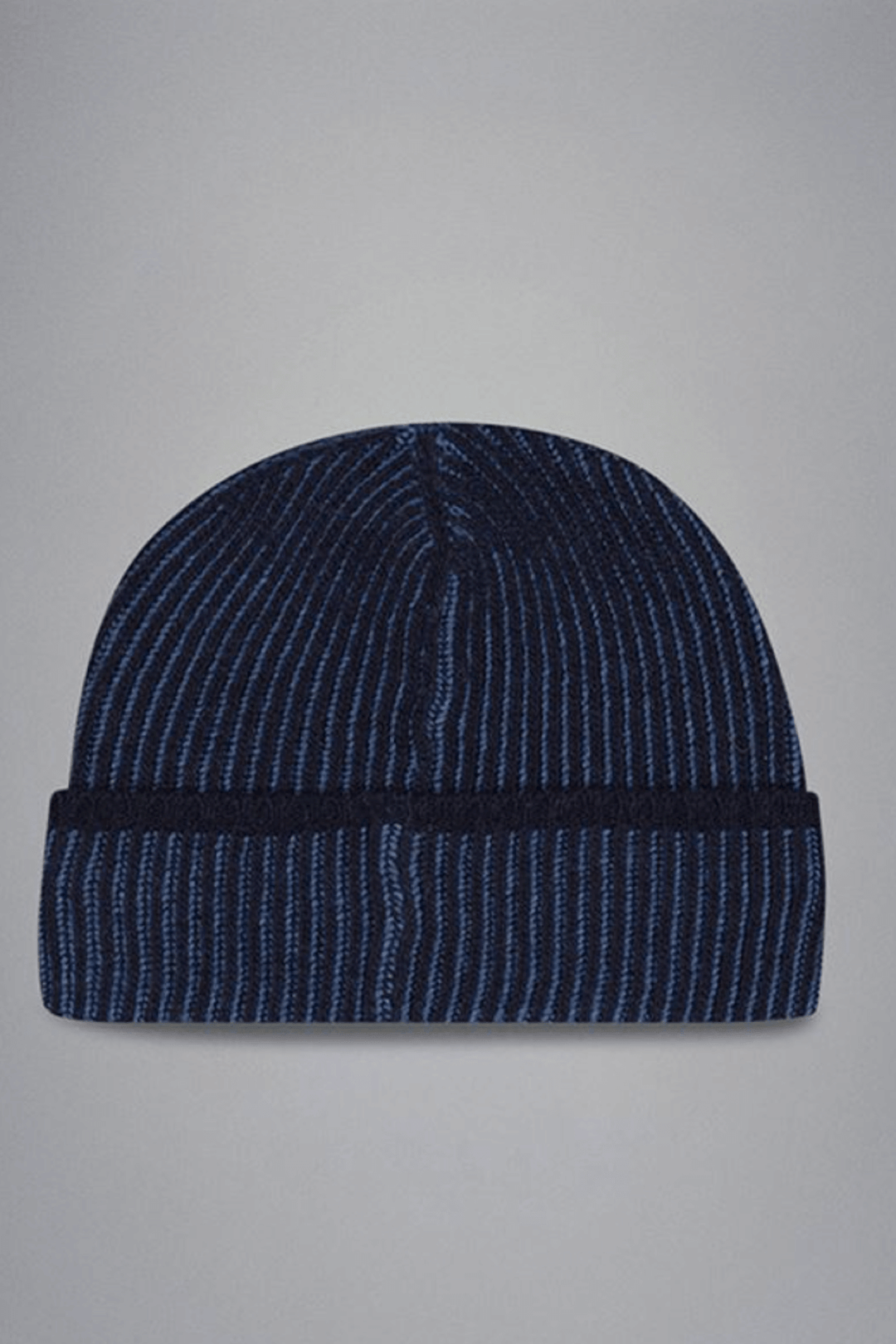 Tuque côtelée en laine vierge, bicolore, avec revers, idéale pour un look hivernal chic.