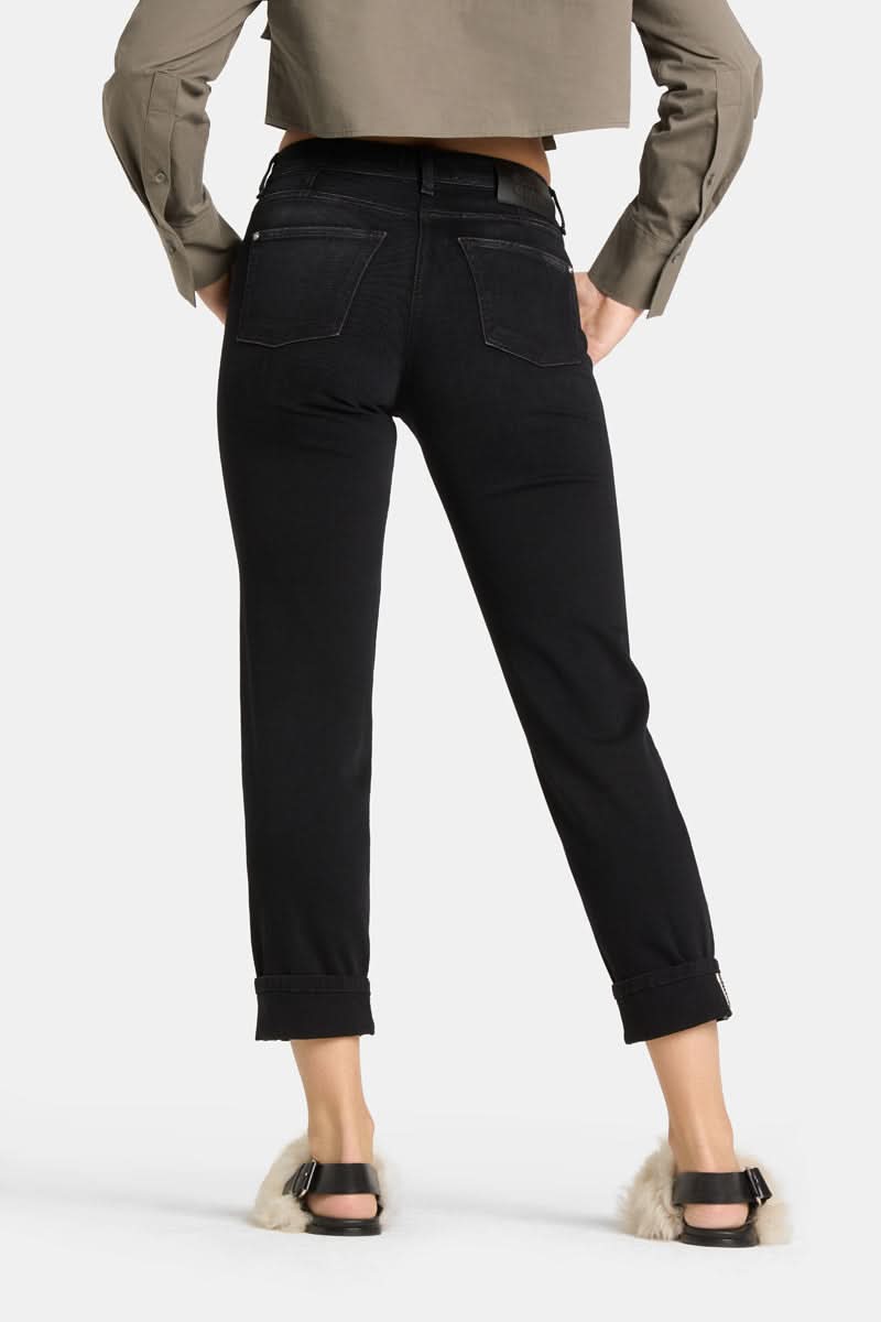 Jeans slim noir à revers