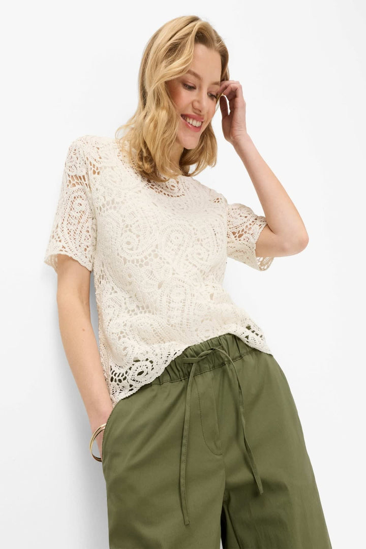 Vue de côté pantalon ample Brax pour femme beige à taille élastique - Valérie Simon