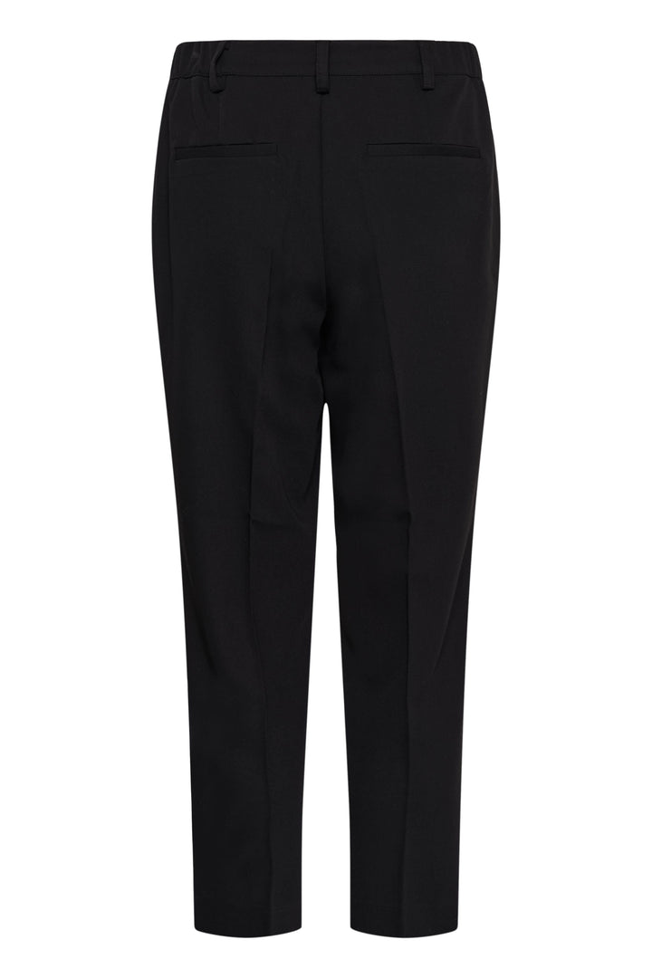 Vue de profil pantalon habillé Kaffe pour femme noir à jambe droite écourtée avec ourlet fendu - Valérie Simon