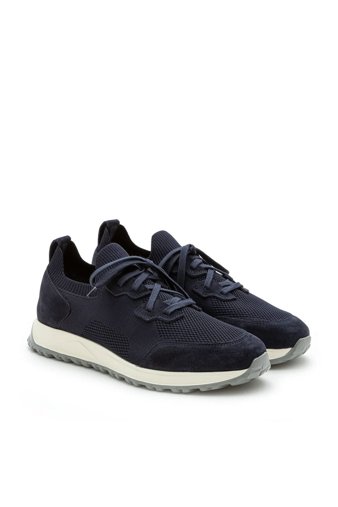Sneaker homme cuir et tissu extensible en bleu, semelle ultralégère, look moderne et confort exceptionnel.