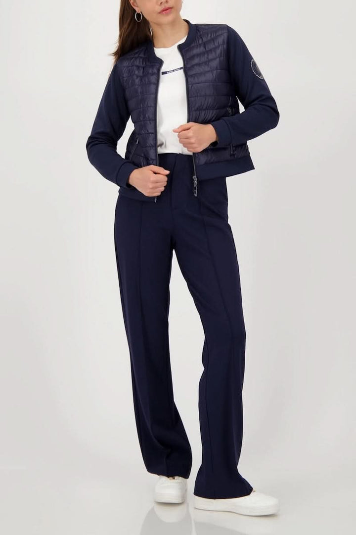 Veste matelassée bimatière à fermeture éclair, style moderne pour look chic et sportif. Décris moi le produit en français.