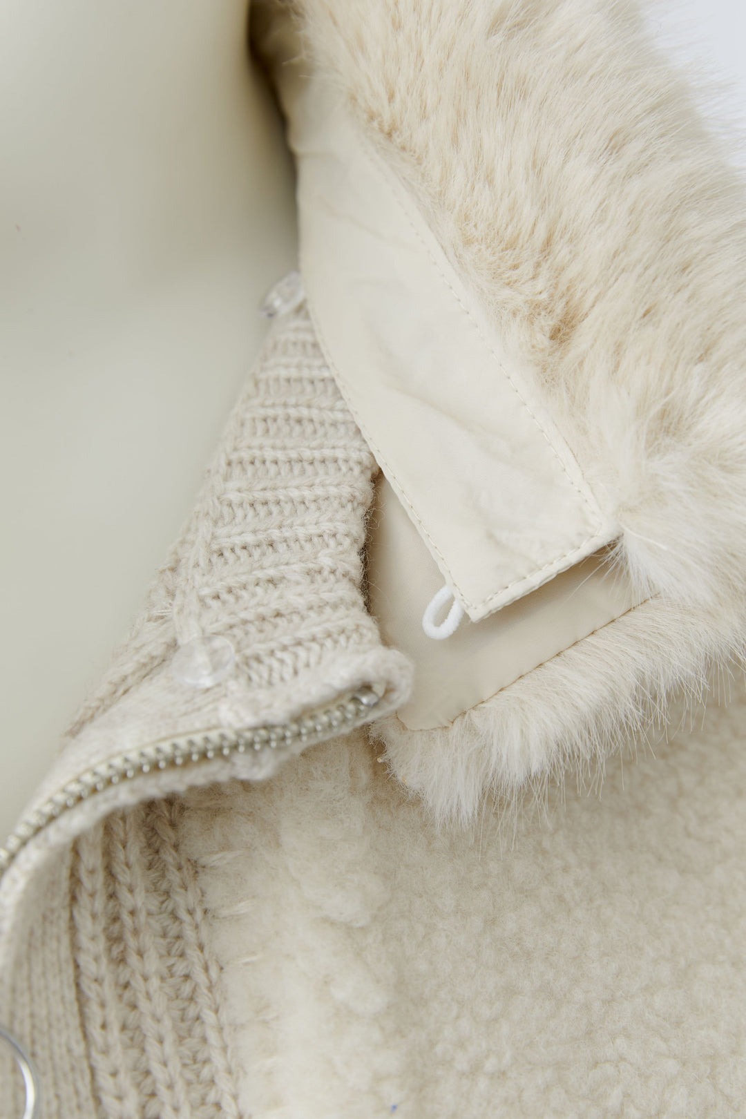 Veste courte en maille et fausse fourrure pour femme Oui