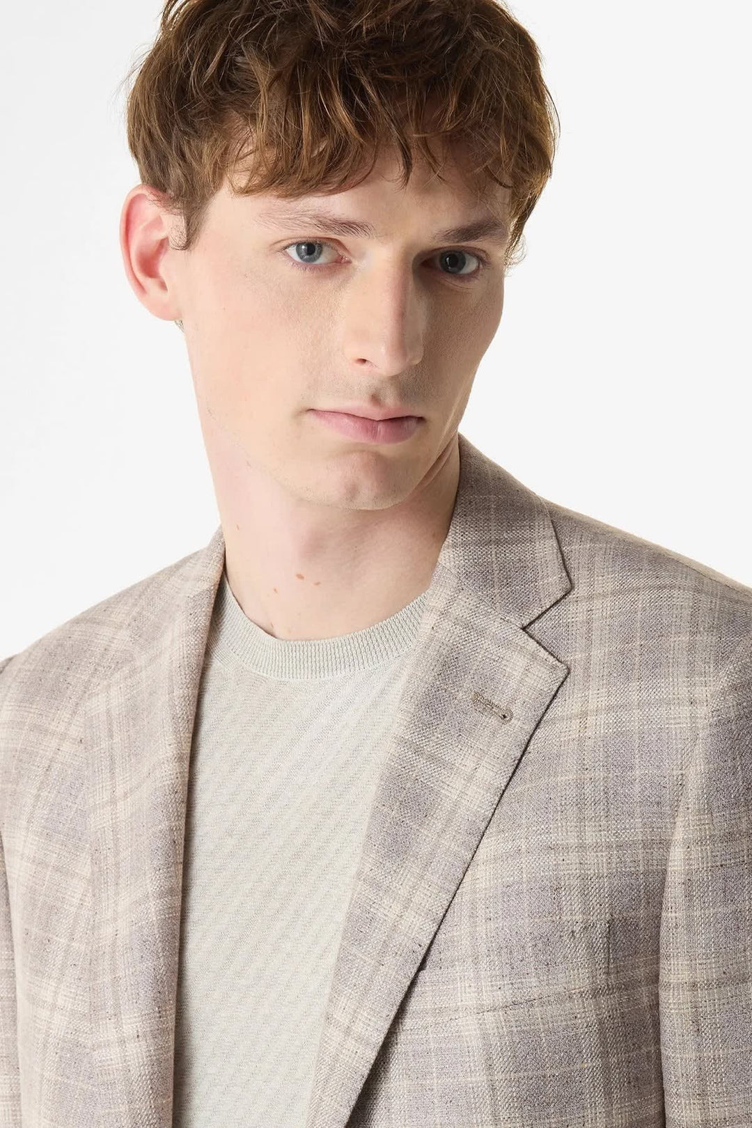 Vue de face veston à carreaux texturés Corneliani pour homme gris et bleu - Valérie Simon