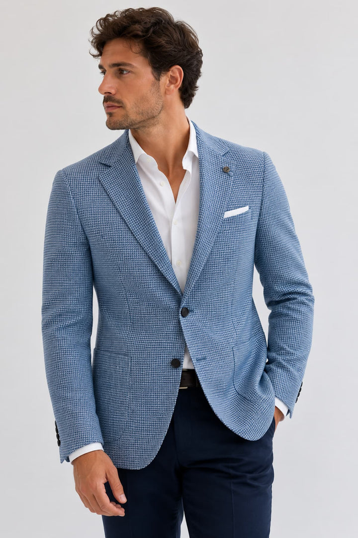 Elegant gray blazer with a subtle texture, front view, visible chest pocket - Valérie Simon