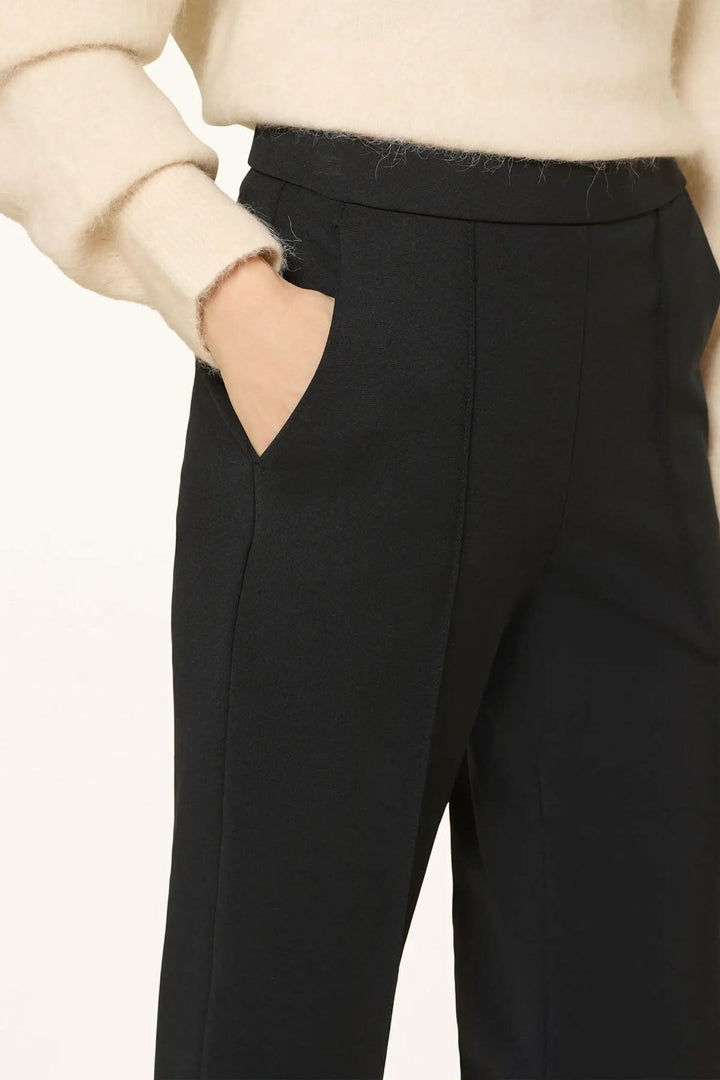 Pantalon habillé coupe droite à plis marqués