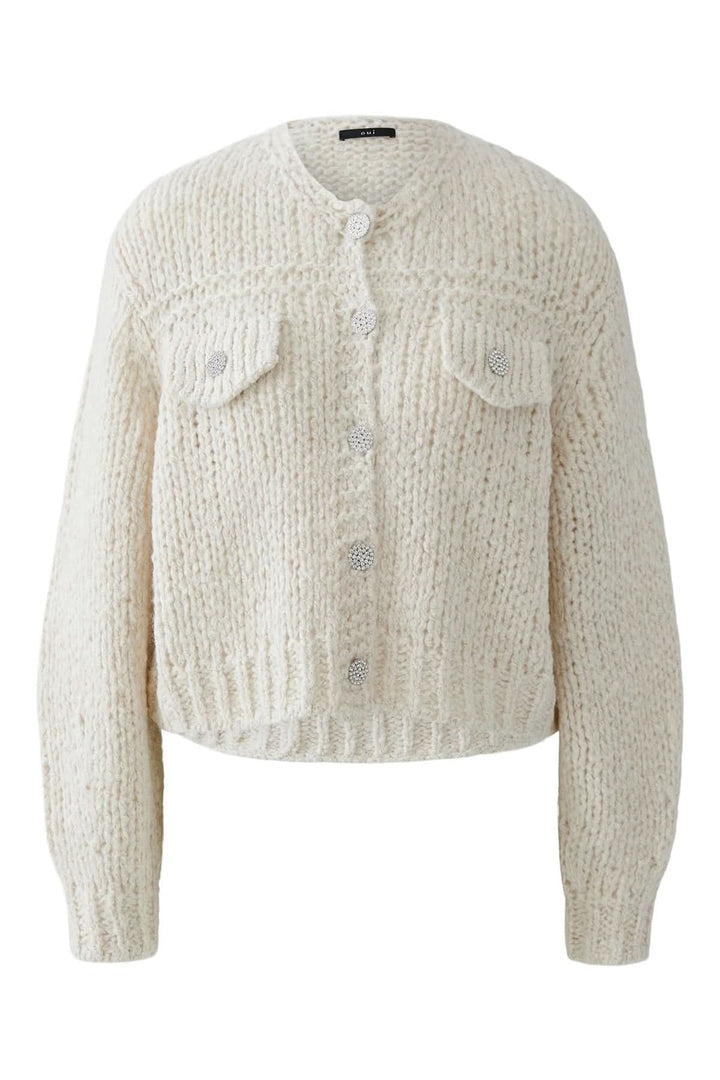 Veste en tricot épais à boutons bijoux avec maille texturée et poches décoratives, idéale pour l'automne et l'hiver.