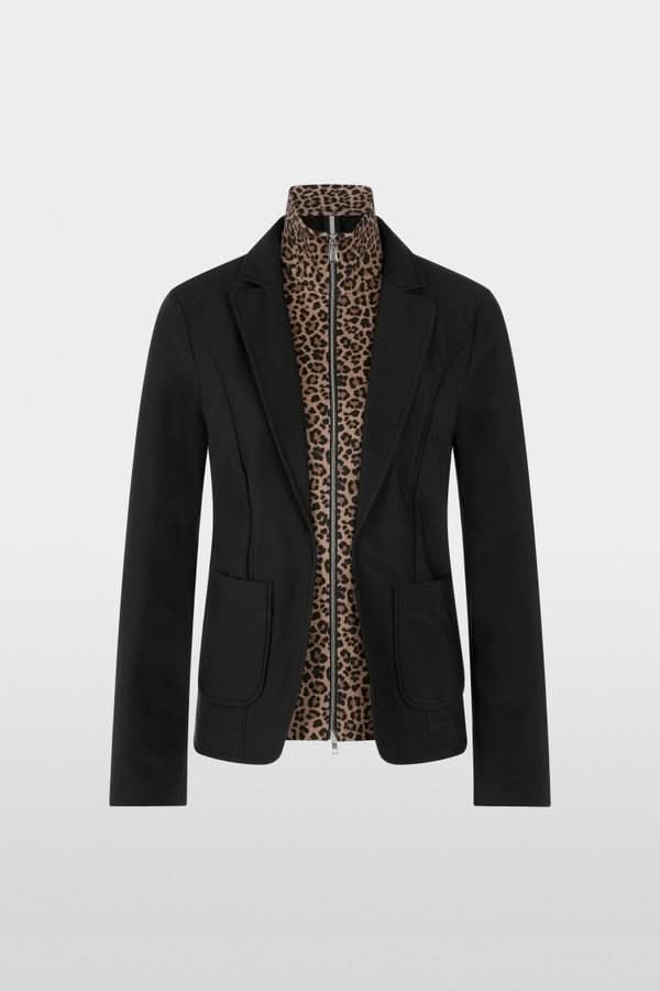 Veste avec supperposition élégante et ajustée, matière extensible, revers classiques, haut zippé motif léopard, féminin et audacieux.