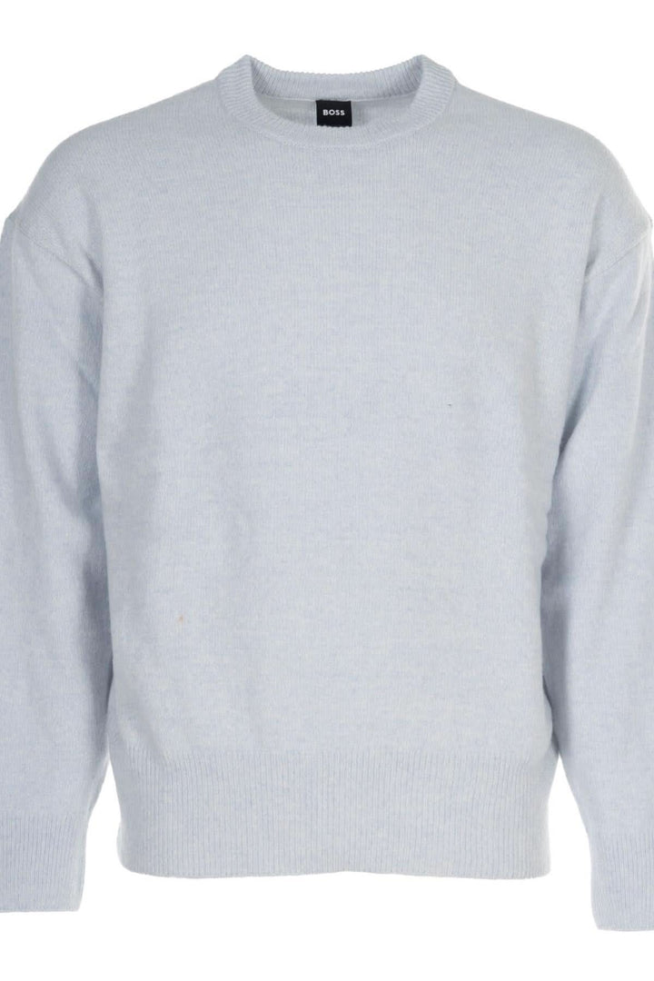 Chandail en laine vierge coupe "oversize", confort et modernité avec maille douce thermorégulatrice, idéal pour superpositions raffinées.