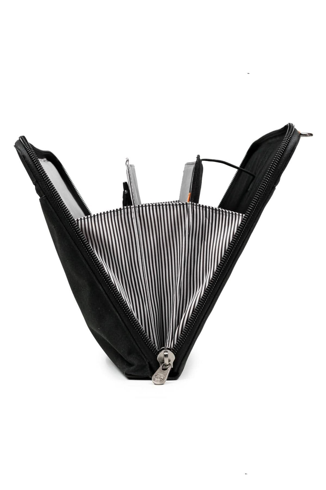 Sac messager accordéon Wellington 10L ouvert, montrant l'intérieur rayé et les poches pour accessoires.